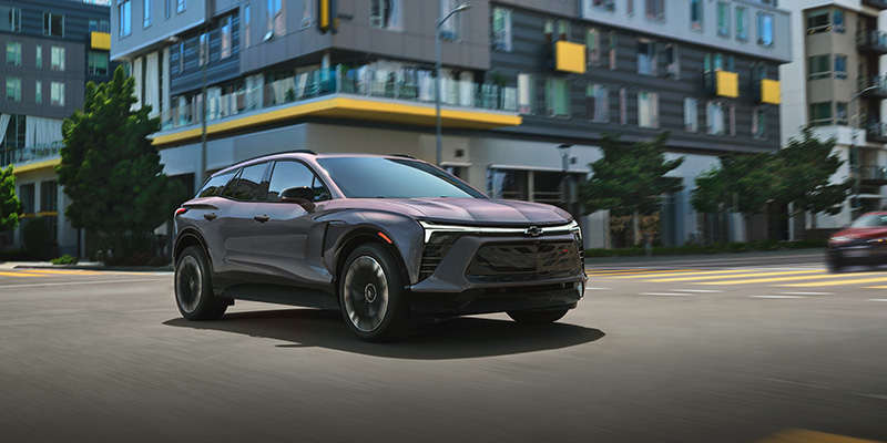 a 2025 Chevrolet Blazer EV driving on a city street